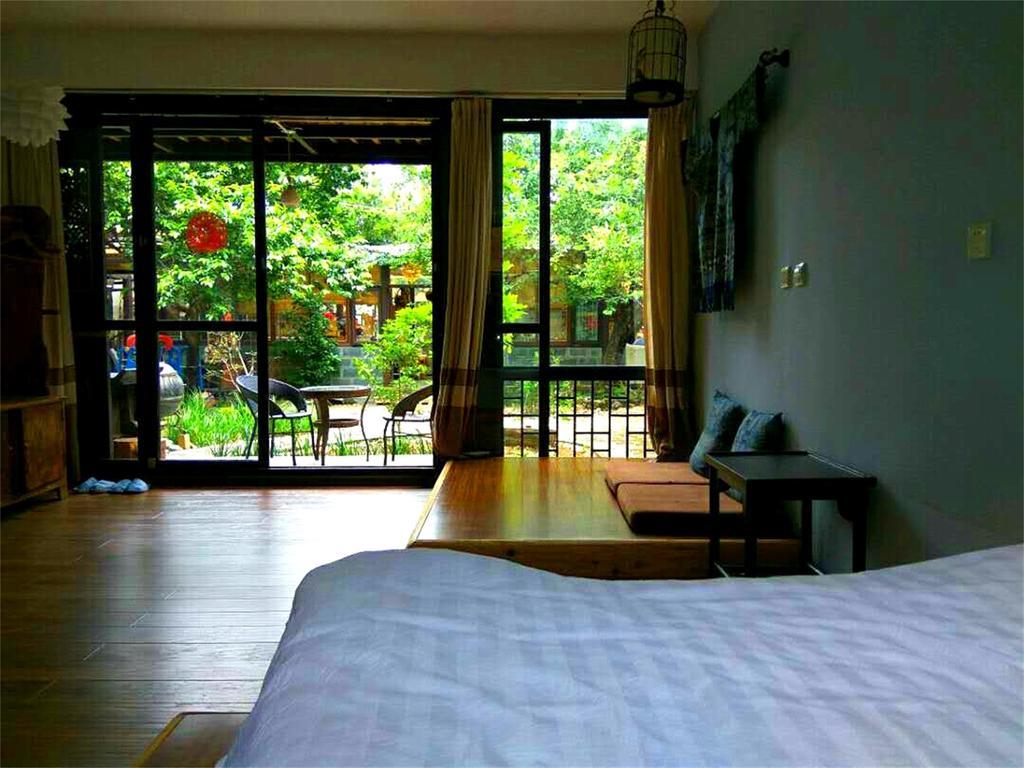 Lijiang Baisha Free Time Designed Hotel Esterno foto